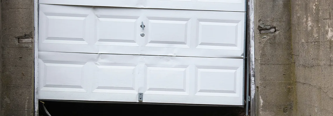 Garage Door Got Hit By A Car Dent Removal in Cambridge, ON