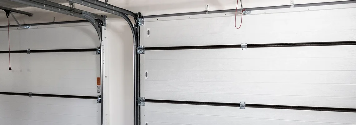 Fix Folding Garage Door Jerking in Cambridge, Ontario