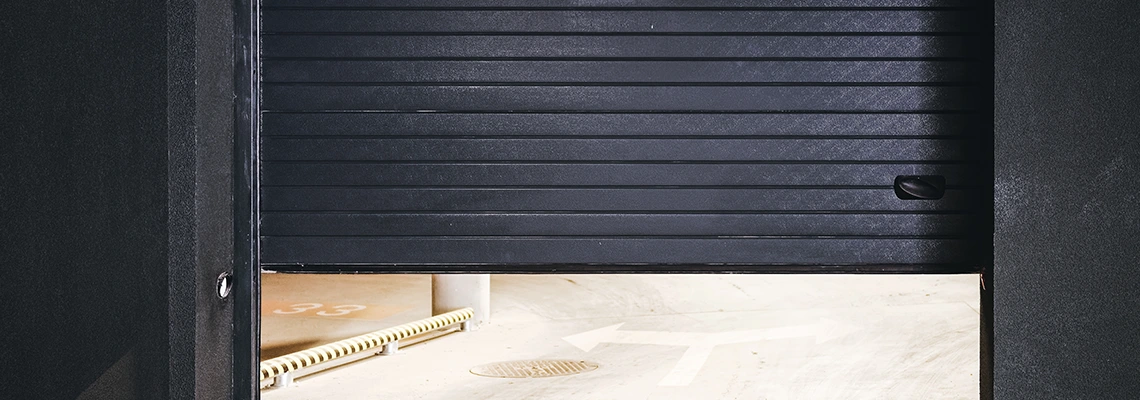 Residential Black Garage Door Installation in Cambridge, ON