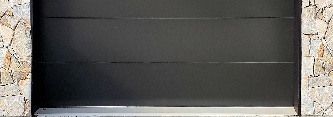 Overhead Black Garage Door Installation in Cambridge, Ontario