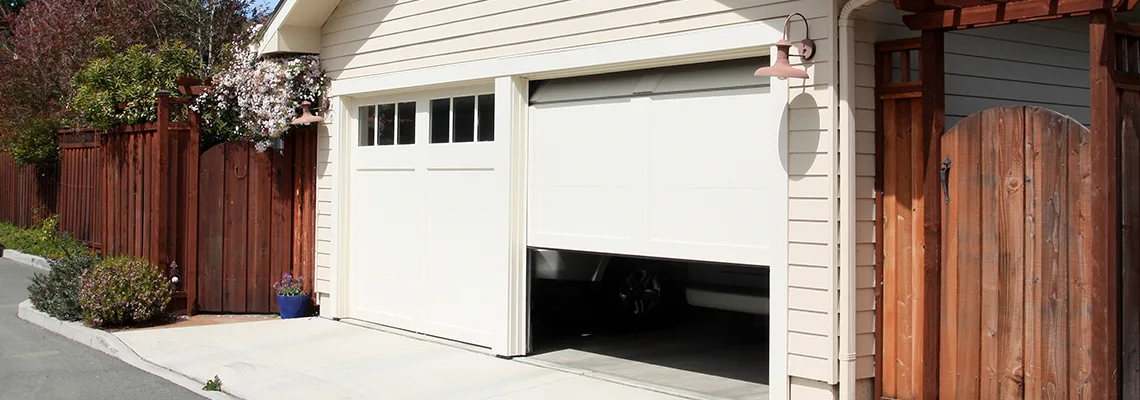 Fix Metal Garage Door Jerking in Cambridge, Ontario